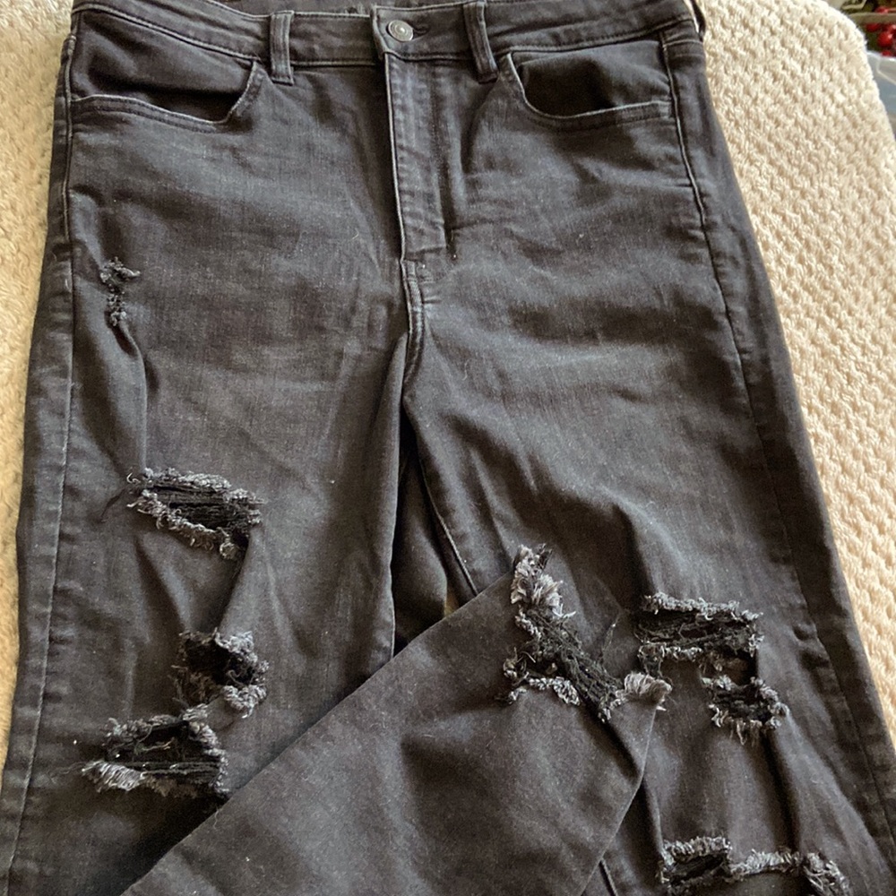 American Eagle next level stretch black jeans. Distressed. Sz 12